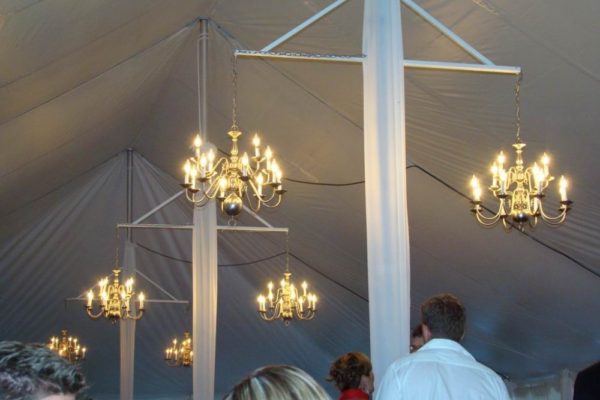 Pole-Tent-with-standard-chandeliers-on-brackets-and-pole-drapes-min